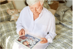 senior looking at photographs